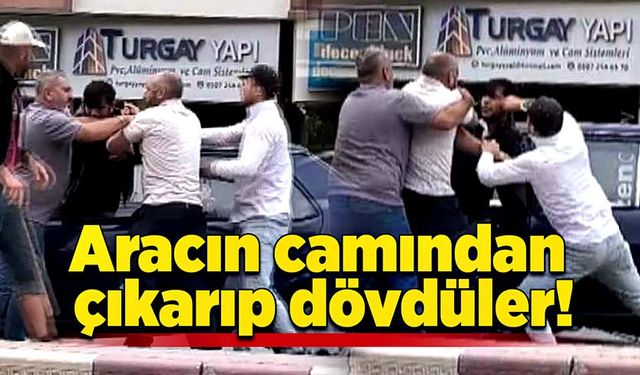 Aracın camından çıkarıp dövdüler!