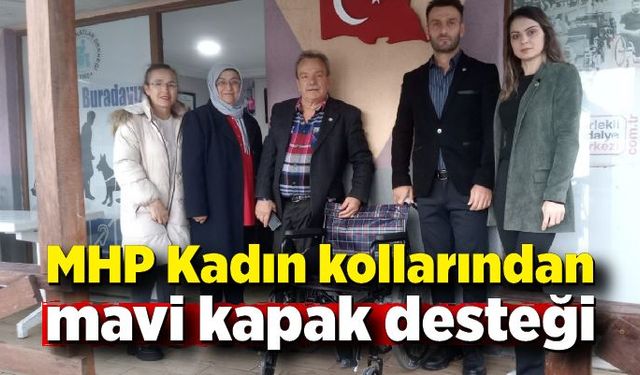 Sakatlar Derneği Şubesine MHP Kadın kollarından mavi kapak desteği