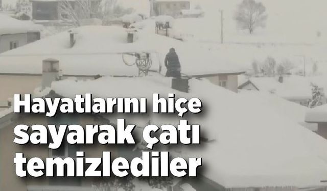 Hayatlarını hiçe sayarak çatı temizlediler