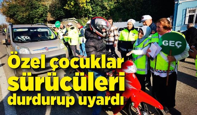 Özel çocuklar sürücüleri durdurup  uyardı