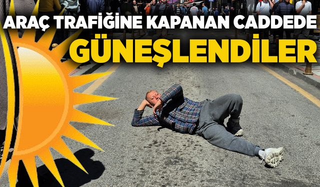 Araç trafiğine kapanan caddede güneşlendiler
