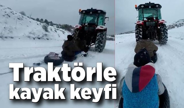 Traktöre bağladıkları lastiklerle kayak keyfi yaptılar