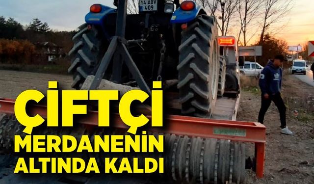 Tarım aletinin altında kalan çiftçi ağır yaralandı