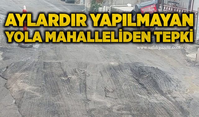 Aylardır yapılmayan yola mahalleliden tepki