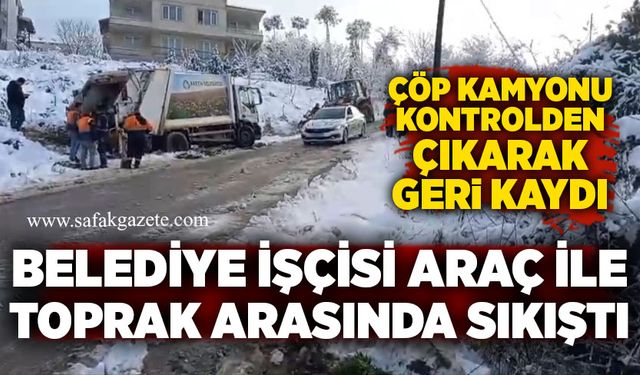 Çöp kamyonu karlı yolda kontrolden çıktı: Belediye işçisi araç ile toprak arasında sıkıştı