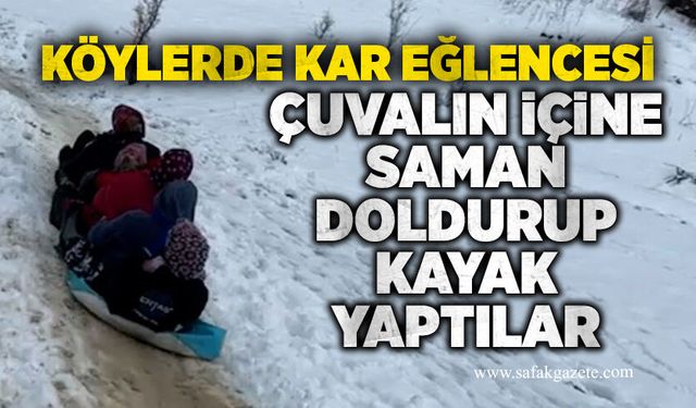 Köylerde kar eğlencesi: Çuvalın içine saman doldurup kayak yaptılar