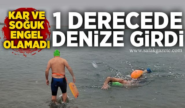 Kar ve soğuk engel olamadı: 1 derecede denize girdi