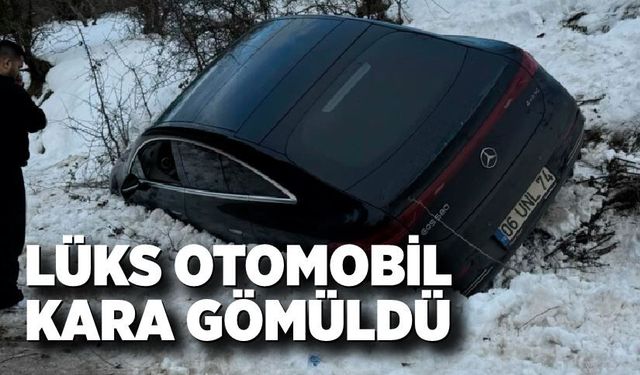 Lüks otomobil kara gömüldü