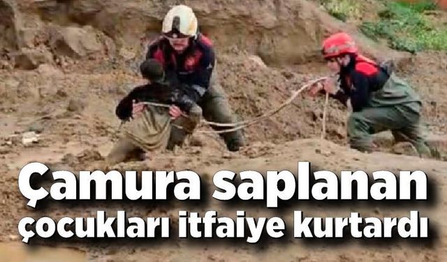 Çamura saplanan çocukları itfaiye kurtardı