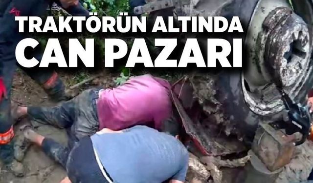 Devrilen traktörün sürücüsü 1 saatlik çalışmayla kurtarıldı