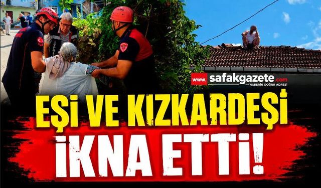 45 dakika boyunca çatıda bekleyen adamı eşi ve kız kardeşi ikna etti