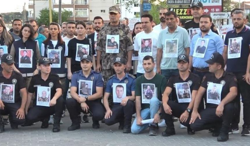 Polisler 15 Temmuz şehitlerinin resimlerini göğüslerinde taşıdı