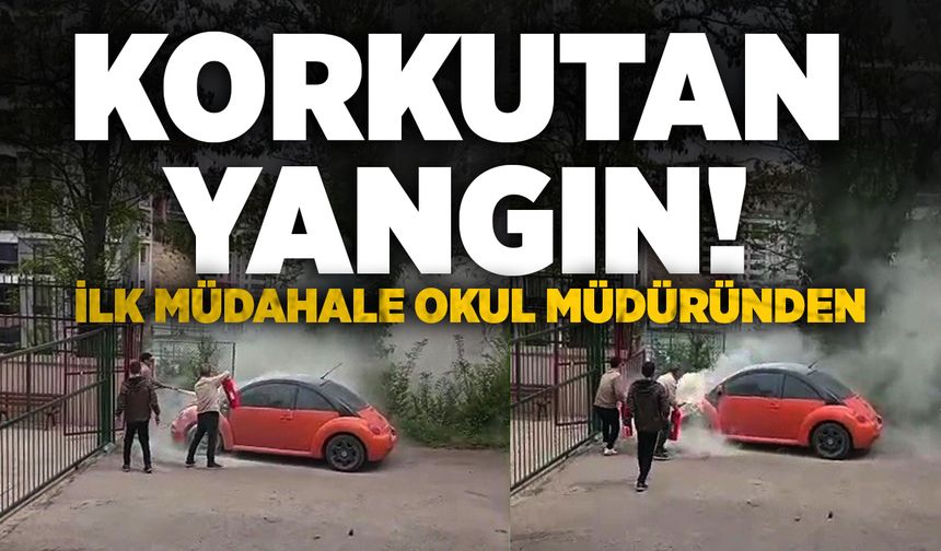 Alev alan otomobile ilk müdahale okul müdüründen