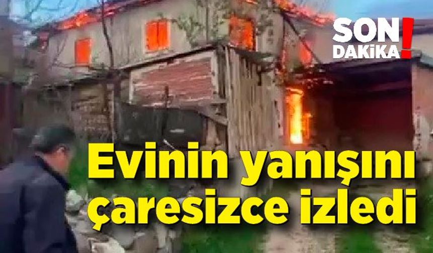 Evinin yanışını çaresizce izledi