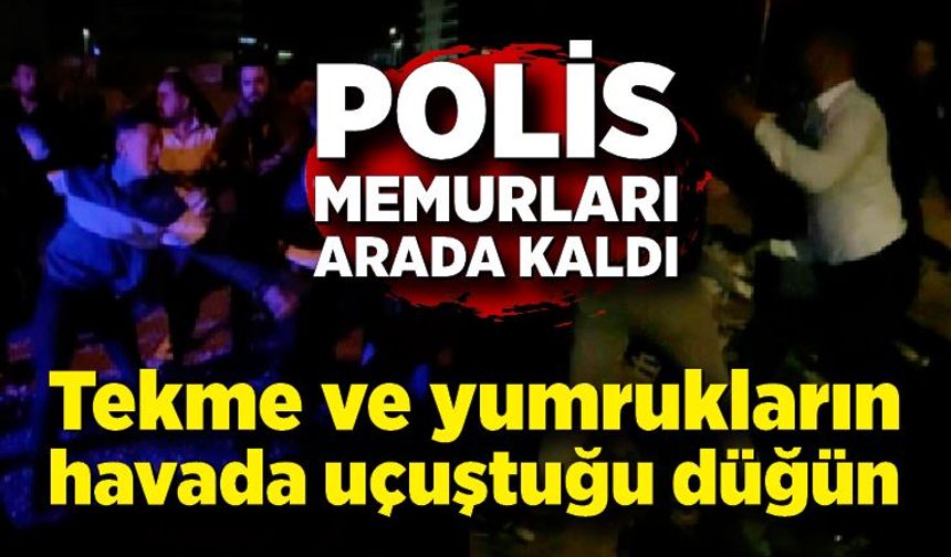 Tekme ve yumrukların havada uçuştuğu düğün kavgasında polis memurları arada kaldı