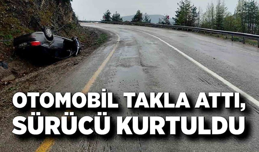Takla atan otomobilden yara almadan kurtuldu