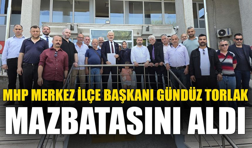 MHP Merkez İlçe Başkanı Gündüz Torlak mazbatasını aldı